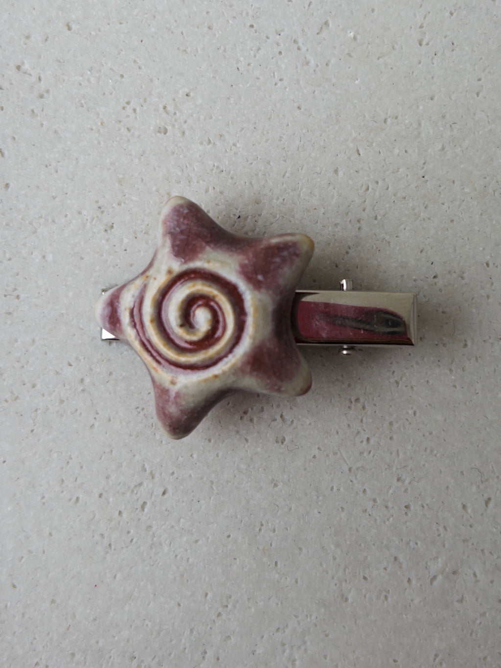Swirl Star Clip
