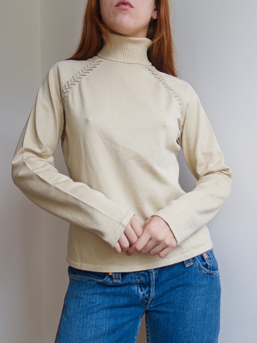 Suede Stitched Turtleneck