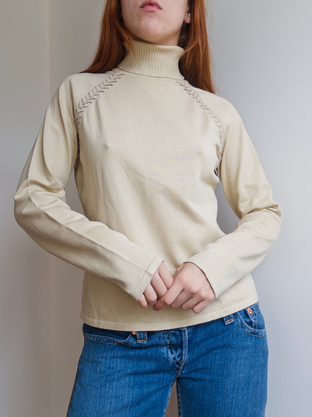 Suede Stitched Turtleneck