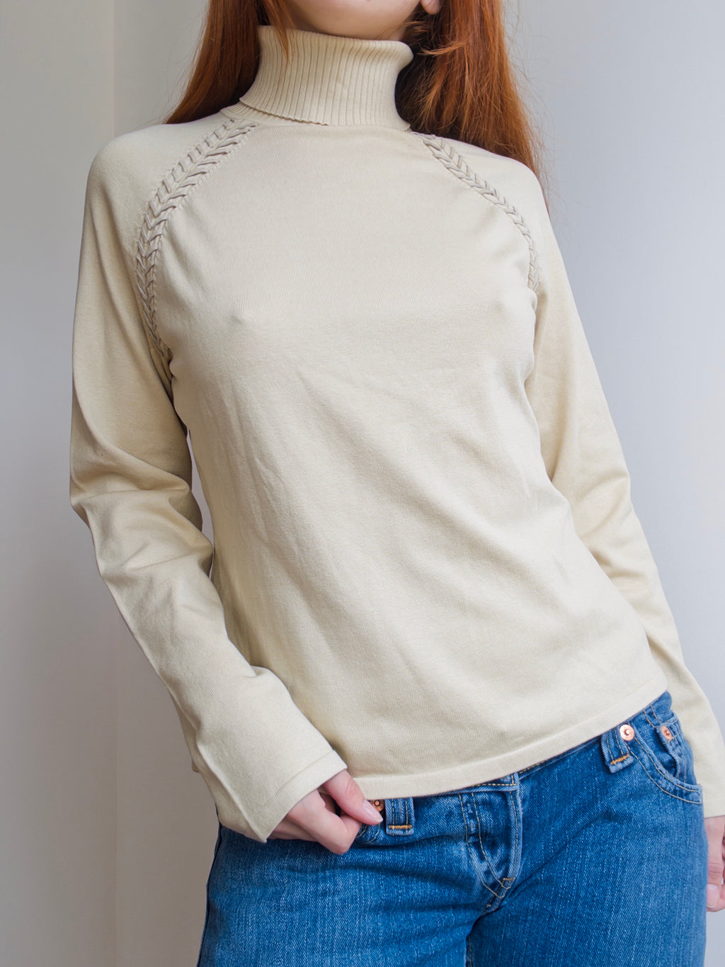 Suede Stitched Turtleneck