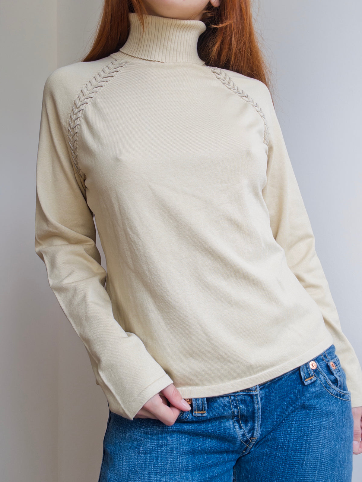 Suede Stitched Turtleneck