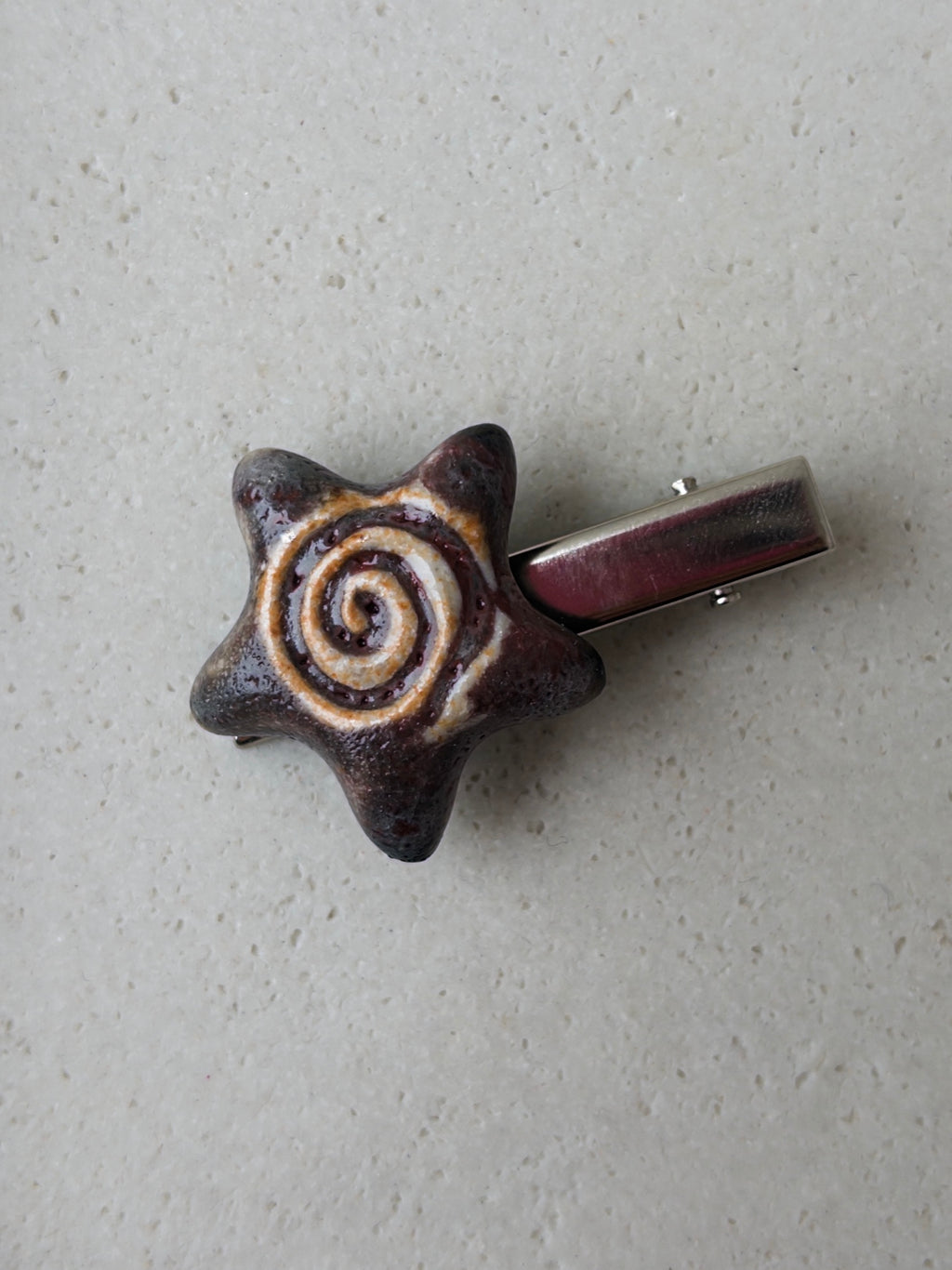 Swirl Star Clip