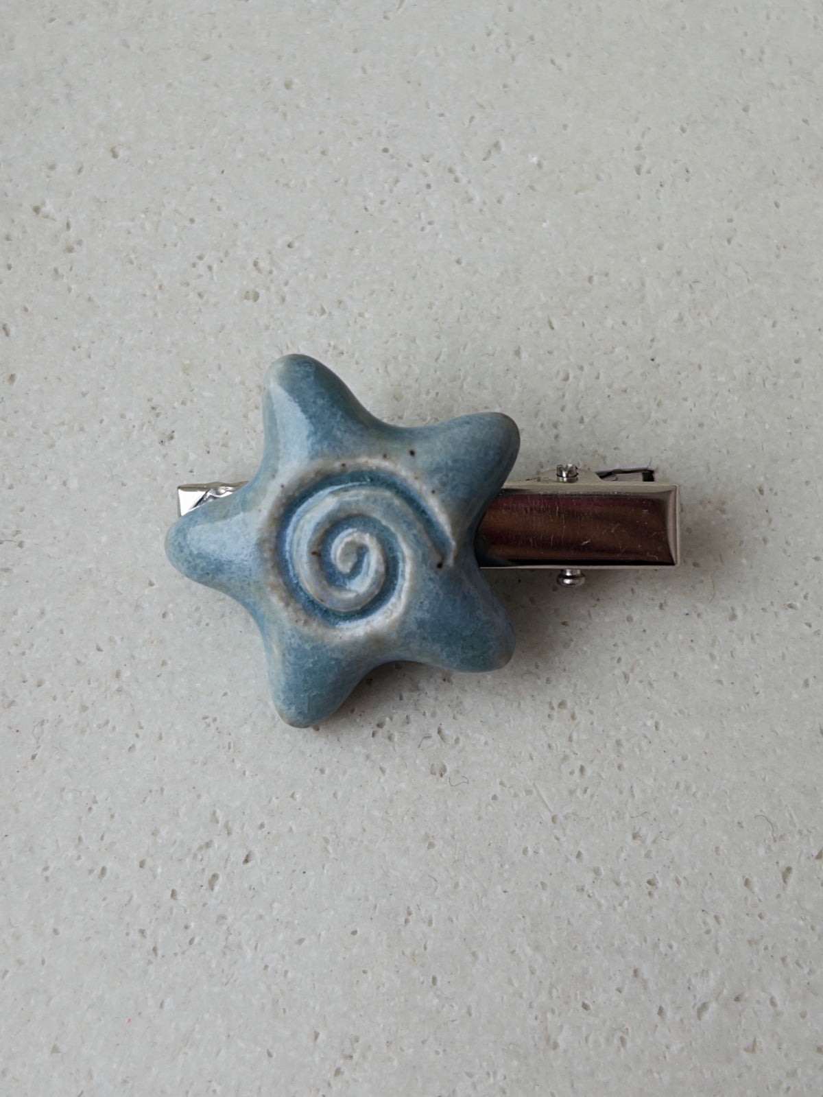 Swirl Star Clip