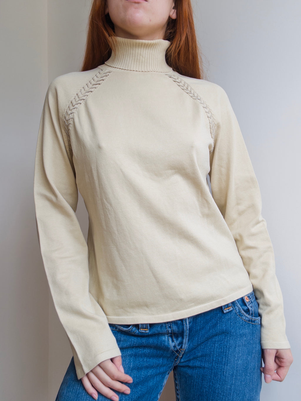 Suede Stitched Turtleneck